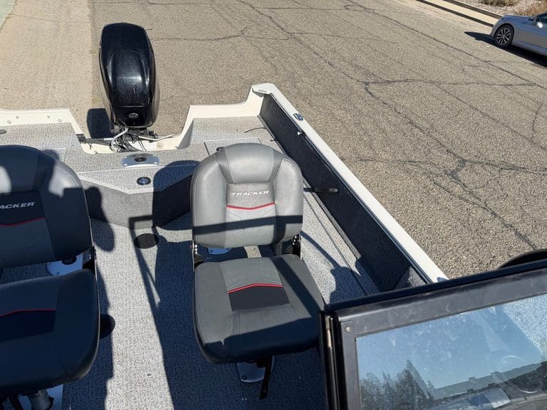 Close-up of boat seats and steering console on a Tracker Pro boat.