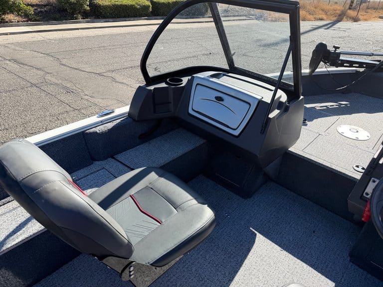 Close-up of boat dashboard and captain's seat at ASFB Marine.