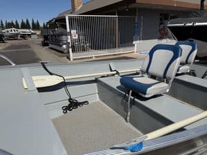 Interior view of a 2022 Klamath 15FT Advantage boat with seating and fishing area.
