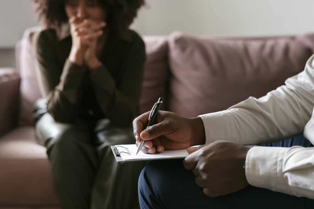 Person receiving support at a community access line service.