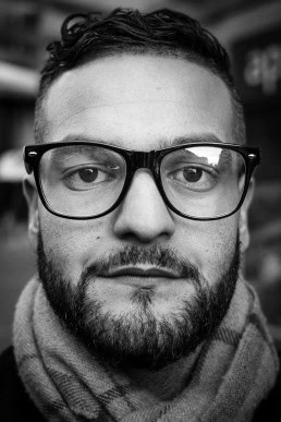Black and white closeup portrait of a man from Algeria taken in Brussels