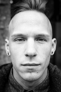 Black and white closeup portrait of a man from Belgium taken in Brussels