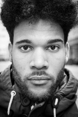 Black and white closeup portrait of a man from Belgium taken in Brussels
