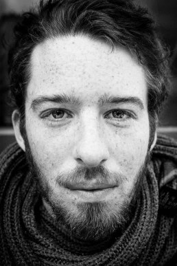 Black and white closeup portrait of a man from Belgium taken in Brussels