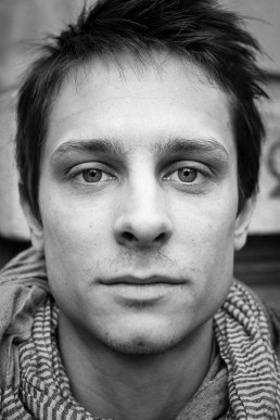 Black and white closeup portrait of a man from Belgium taken in Brussels