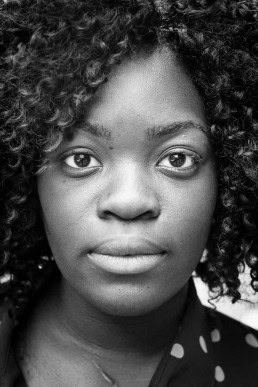 Black and white closeup portrait of a woman from Belgium taken in Brussels