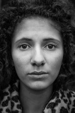 Black and white closeup portrait of a woman from Belgium taken in Brussels