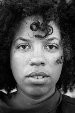 Black and white closeup portrait of a woman from Belgium taken in Brussels