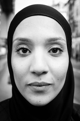Black and white closeup portrait of a woman from Belgium taken in Brussels