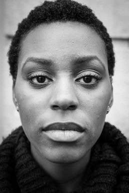 Black and white closeup portrait of a woman from Burundi taken in Brussels