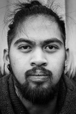 Black and white closeup portrait of a man from Philippines taken in Brussels