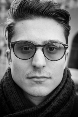 Black and white closeup portrait of a man from Romania taken in Brussels