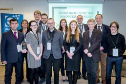 A group of speakers, awardees and organizers posing at the end of the event for EURADA