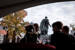 A group of people enjoying a drink at the Groenplaats, Antwerp during the Dag van Spanje event