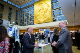 Two men talking and networking during the 2018 CS International Conference in Brussels