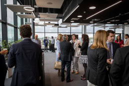 People networking while awaiting for the general assembly of EURADA in Charleroi