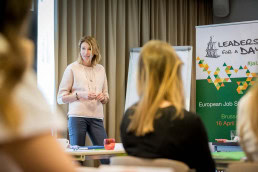 A speaker addresses her workshop students for a JA Europe event in Brussels