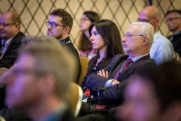 A participant listens attentively a speaker during the CS International Conference 2018