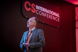 A speaker looks at his slides during his presentation at the CS International Conference 2018