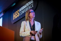 A speaker looks at her presentation in the HES room during the CS International Conference 2018