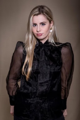 Portrait of a blond girl with black shirt