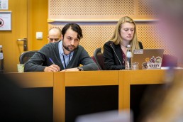 Attendees taking notes during the MCE Conference at the EU Parliament