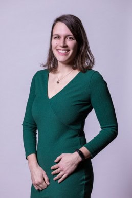 Corporate Portrait of a woman wearing a green dress for ECOS in Brussels