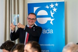 Esteban Pelayo hold an award during the 2020 Brokerage Event for Innovation Agencies by EURADA