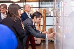 A man interacting with a white board for networking during the 2020 Brokerage Event for Innovation Agencies by EURADA