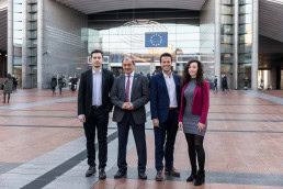 Group picture of the Social Economy Europe team in front of the European Parliament