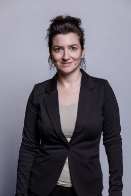 Corporate portrait of a woman wearing a black jacket for Berquin Notarissen in Brussels	