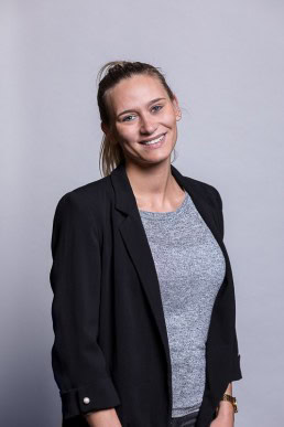 Corporate portrait of a woman wearing a dark jacket for Berquin Notarissen in Brussels	