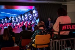 The cover picture of Casa de Papel on the screen during the Netflix Belgium Walking Dinner in Brussels