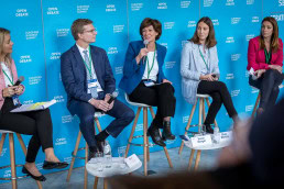A discussion panel talking during a conference for JA Europe in Brussels