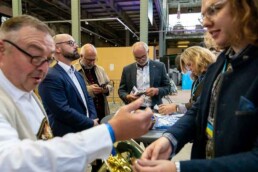 People registering to the event getting bracelets