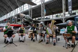A music band playing music at the Royal Museum of Armed Forces