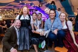 A group of guests during the Brussels Oktoberfest 2025 dressed in typical Bavarian outfits