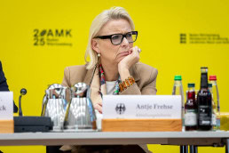 Antje Frehse looking attentively at a conference in Brussels 2025