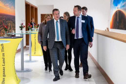 Peter Hauk walking next to Christophe Hansen at a conference in Brussels 2025