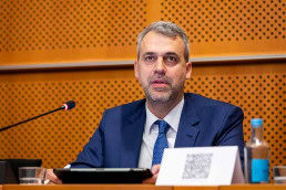 A man giving a speech during the 2025 Epilepsy and Rare Diseases Conference at the European Parliament in Brussels