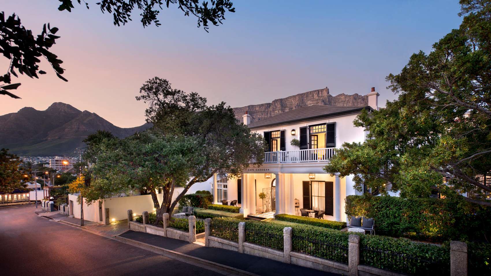 View of Cape Cadogan Boutique Hotel exterior at sunset
