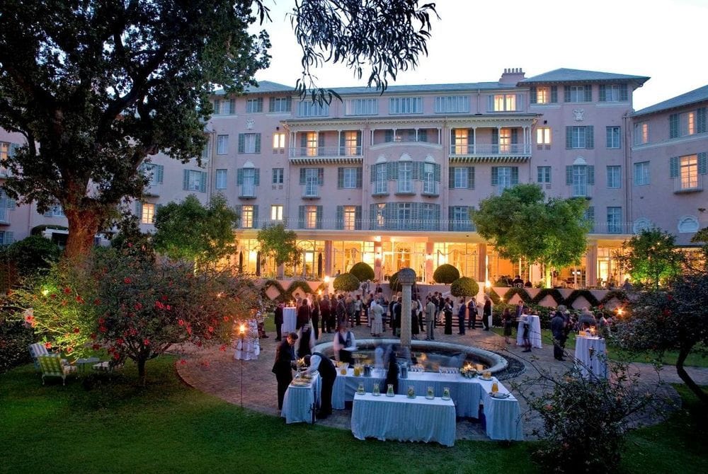 Outside view of the courtyard of the Mount Nelson Hotel at sunset