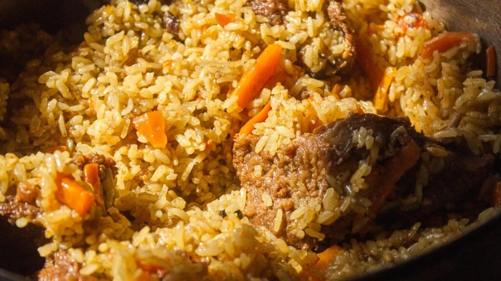 Close up of Pilau being prepared in a pot