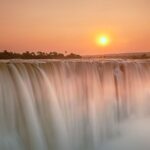 Victoria Falls at Sunset in Zimbabwe | Photo credit: 2630ben via Canva