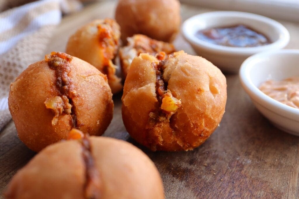 A popular South African Food called Mini vetkoek with mince curry filling. Photo: Getty Images