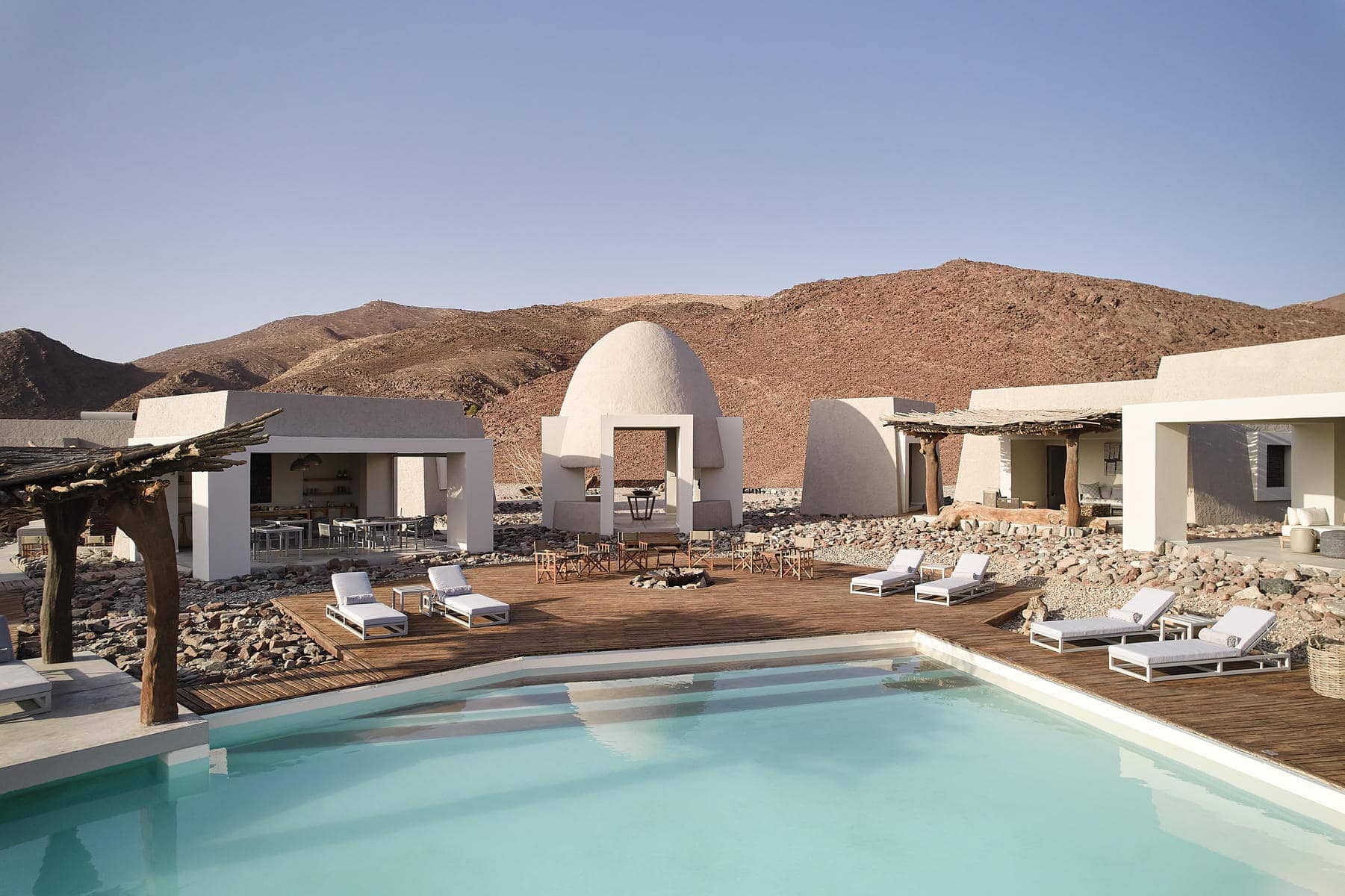 View of the pool area at Okahirongo Elephant Lodge, a luxury safari lodge.
