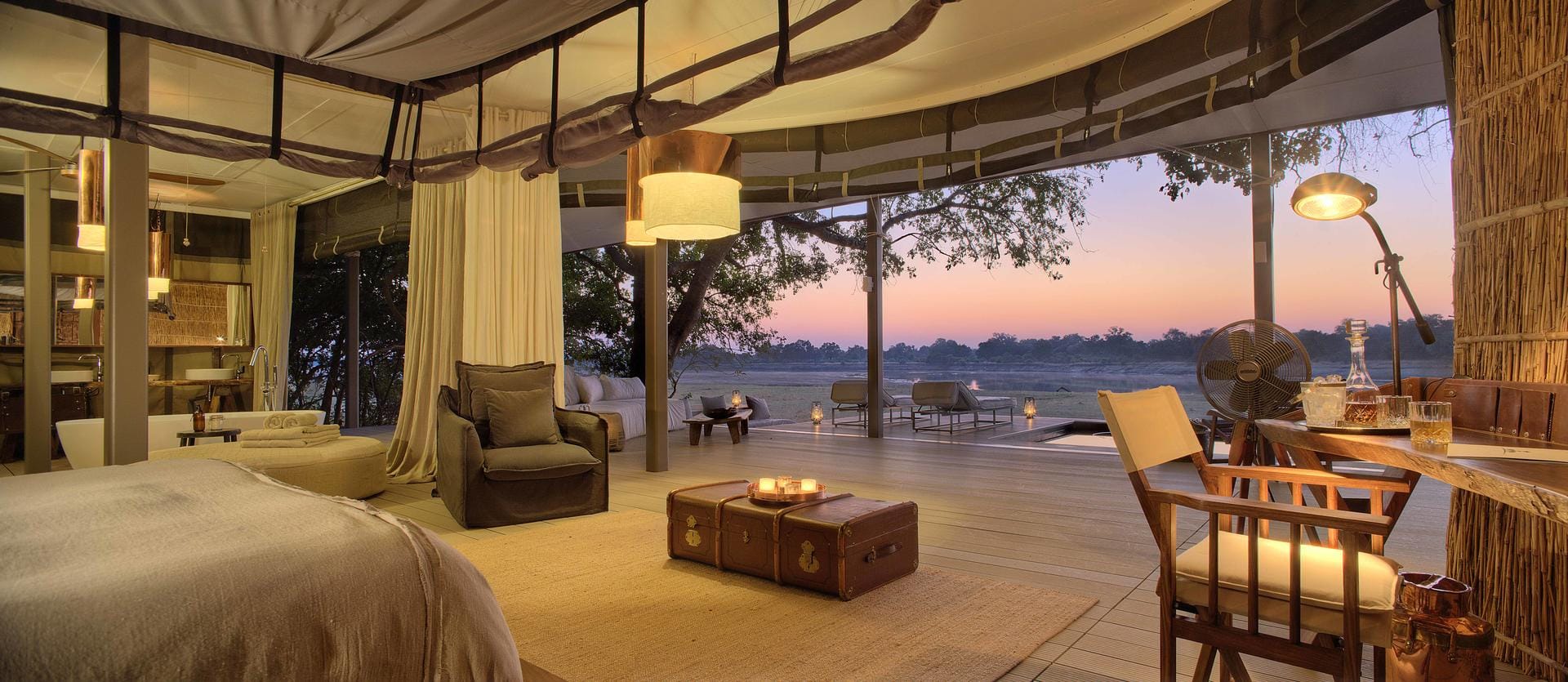 View from the villa of Chinzombo, a luxury safari lodge, at sunset