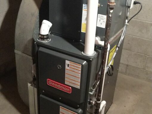 HVAC furnace and equipment installed in a basement or utility room.