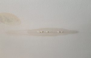 water leaking from drywall on the ceiling