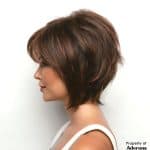 Side view of Reese Large Cap wig with layered brown hair.
